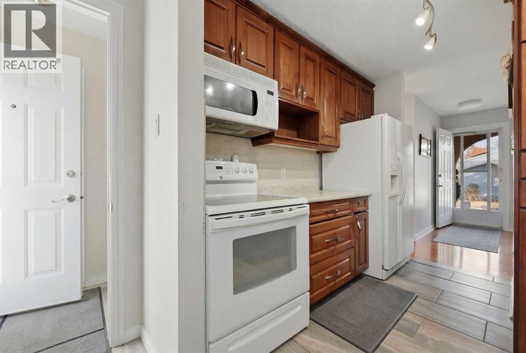 63 Huntmeadow Road Ne, Calgary, Alberta T2K 5H2 - Photo 6 - A2284085