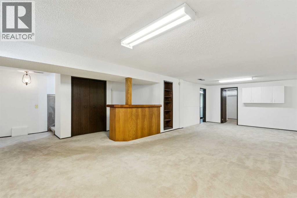 248 Huntcroft Road Ne, Calgary, Alberta  T2K 4E2 - Photo 18 - A2284788