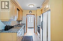 Main - 23 Gatesgill Crescent, Toronto, Ontario  M3M 1Y1 - Photo 9 - W12859718