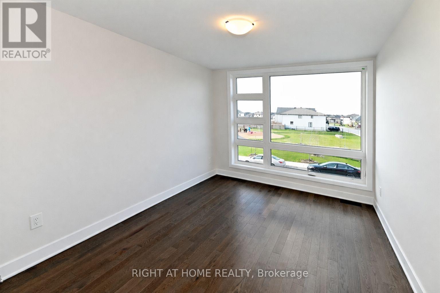 180 Hawkeswood Drive, Ottawa, Ontario  K4M 0E6 - Photo 4 - X12859732