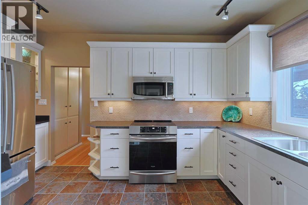 5219 Brisebois Drive Nw, Calgary, Alberta  T2L 2G7 - Photo 13 - A2288012