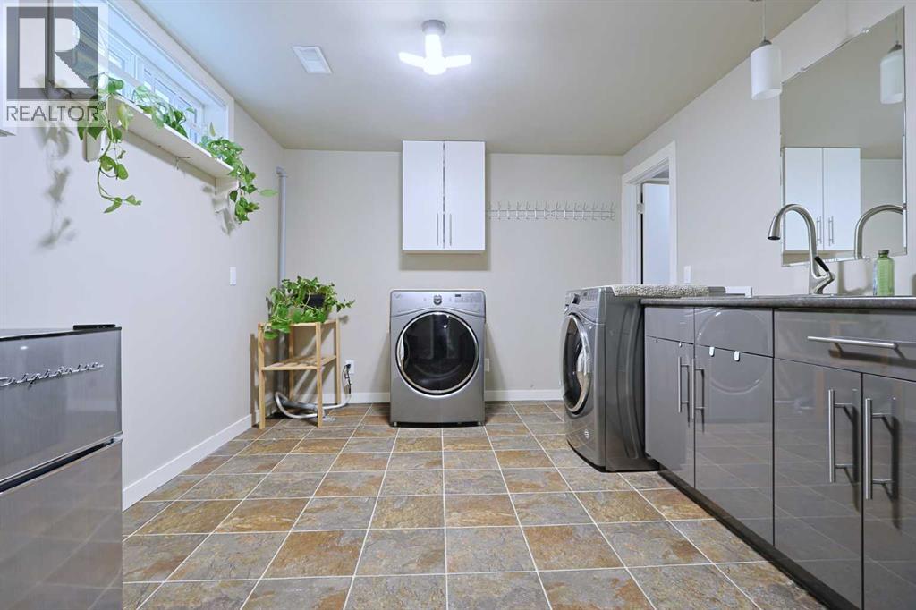 5219 Brisebois Drive Nw, Calgary, Alberta  T2L 2G7 - Photo 25 - A2288012