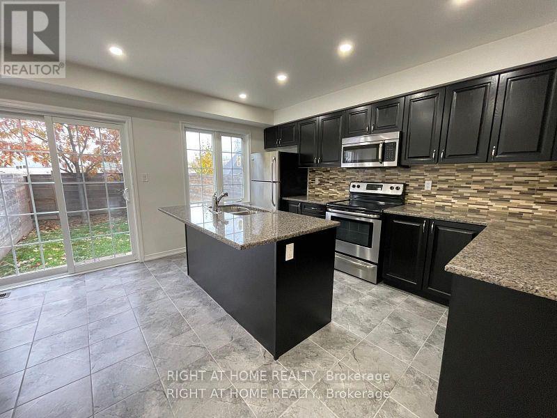 67 Magpie Way, Whitby (Blue Grass Meadows), Ontario  L1N 0K7 - Photo 3 - E12859756