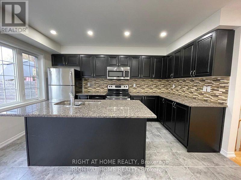 67 Magpie Way, Whitby (Blue Grass Meadows), Ontario  L1N 0K7 - Photo 4 - E12859756