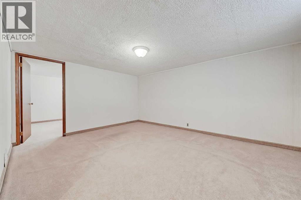 13 Hawthorne Crescent Nw, Calgary, Alberta  T2N 3V4 - Photo 32 - A2289174