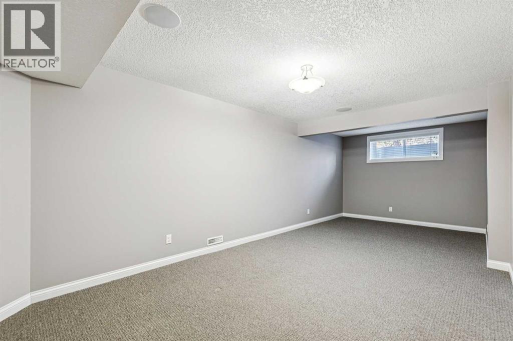 163 Cougar Ridge Manor Sw, Calgary, Alberta  T3H 0V3 - Photo 34 - A2290577