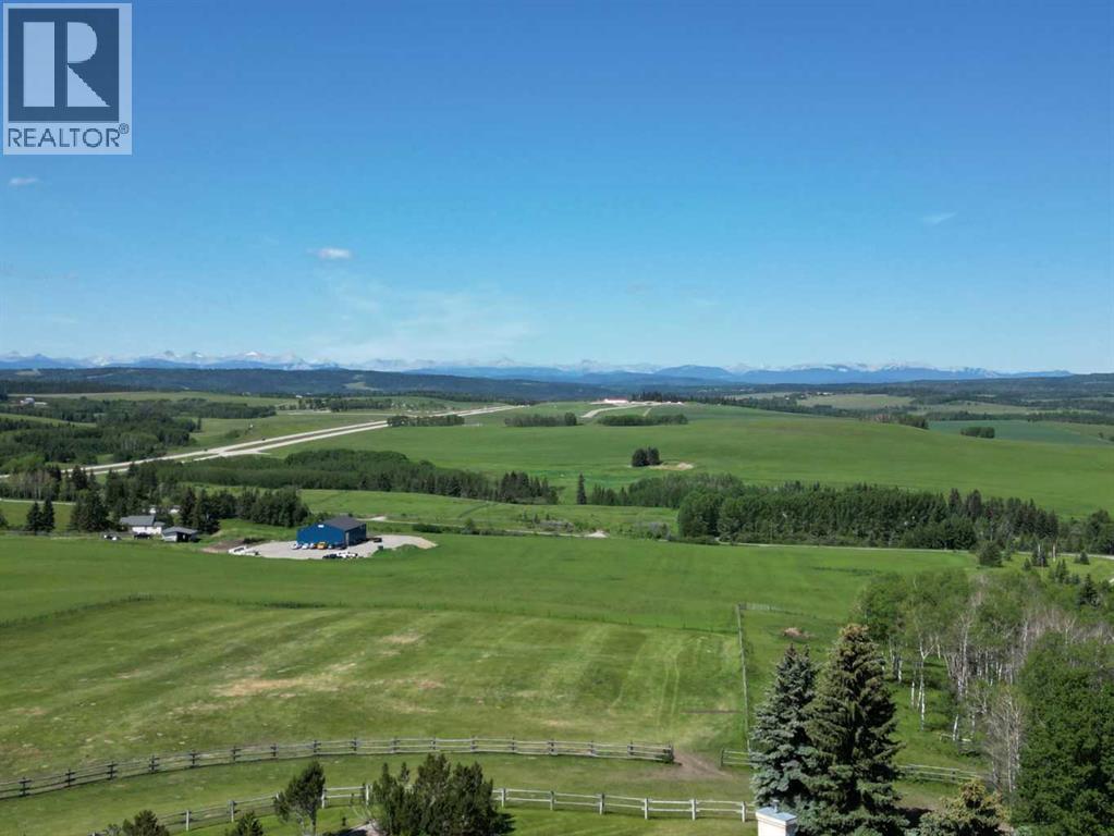 100, 182029 174 Avenue W, Priddis, Alberta  T1S 2B8 - Photo 3 - A2229058