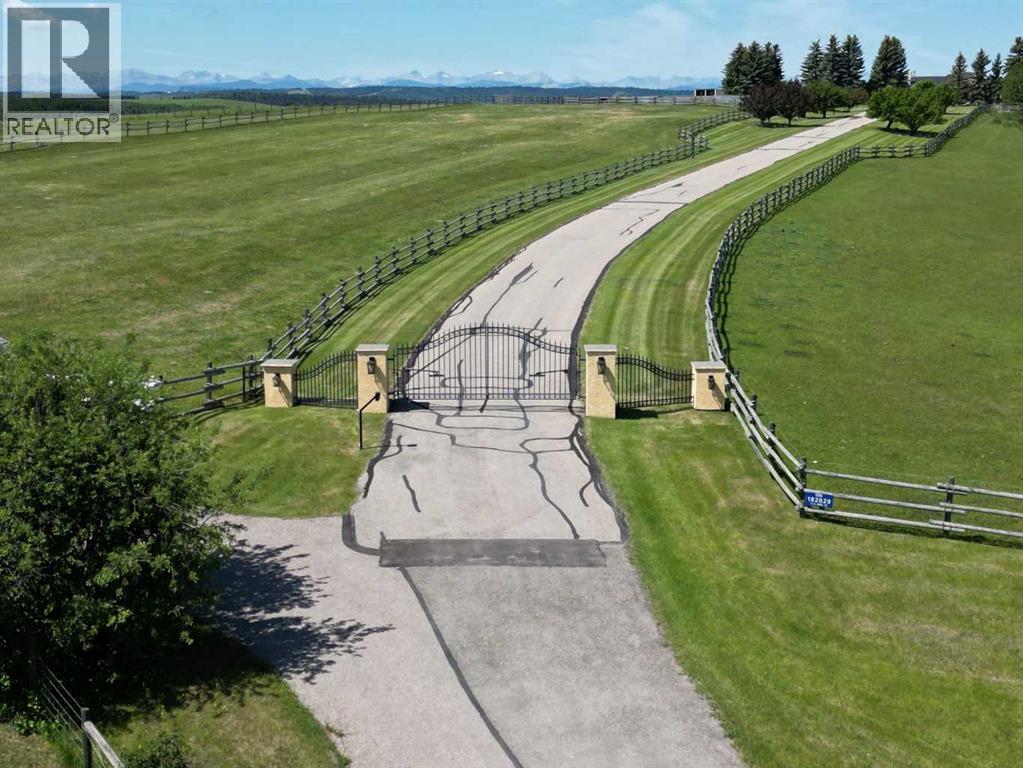 100, 182029 174 Avenue W, Priddis, Alberta  T1S 2B8 - Photo 2 - A2229058