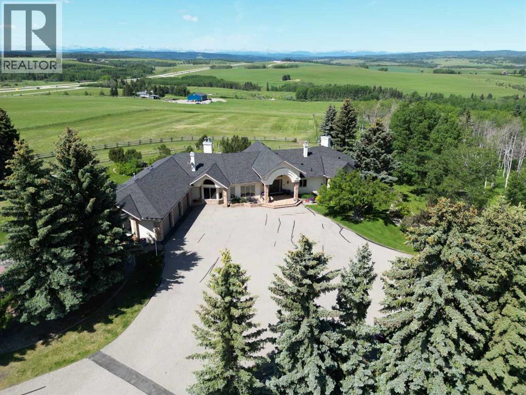 100, 182029 174 Avenue W, Priddis, Alberta