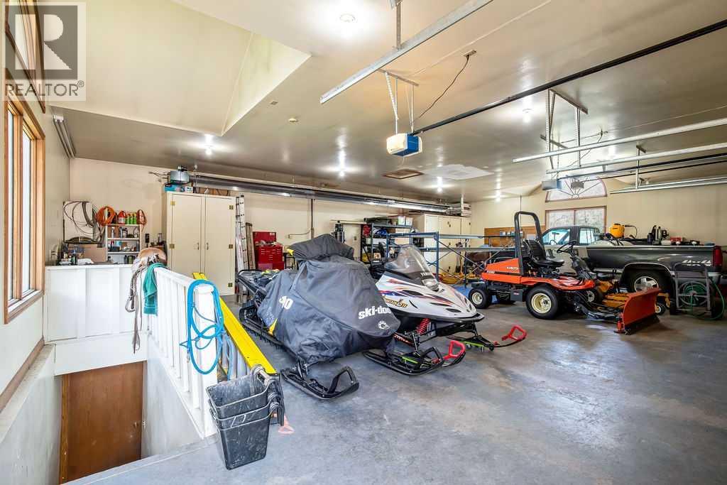 100, 182029 174 Avenue W, Priddis, Alberta  T1S 2B8 - Photo 39 - A2229058