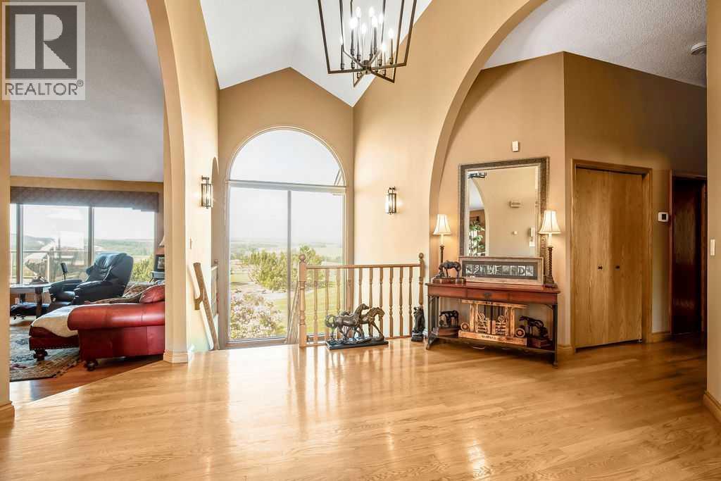 100, 182029 174 Avenue W, Priddis, Alberta  T1S 2B8 - Photo 13 - A2229058