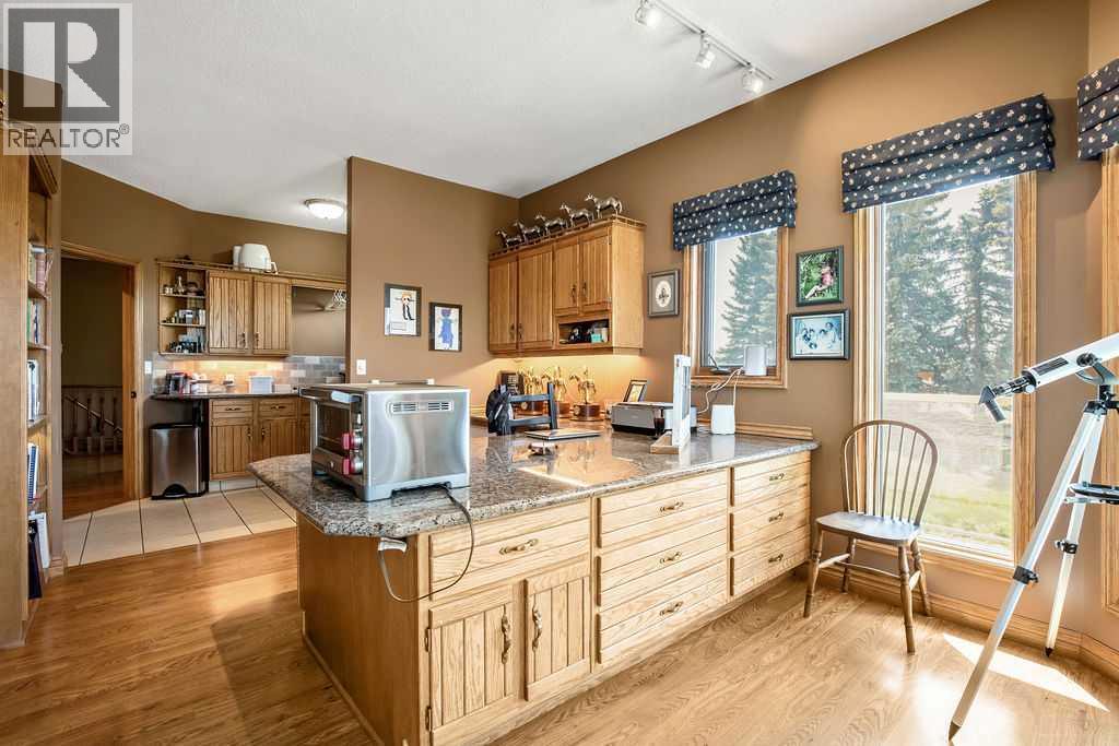 100, 182029 174 Avenue W, Priddis, Alberta  T1S 2B8 - Photo 18 - A2229058