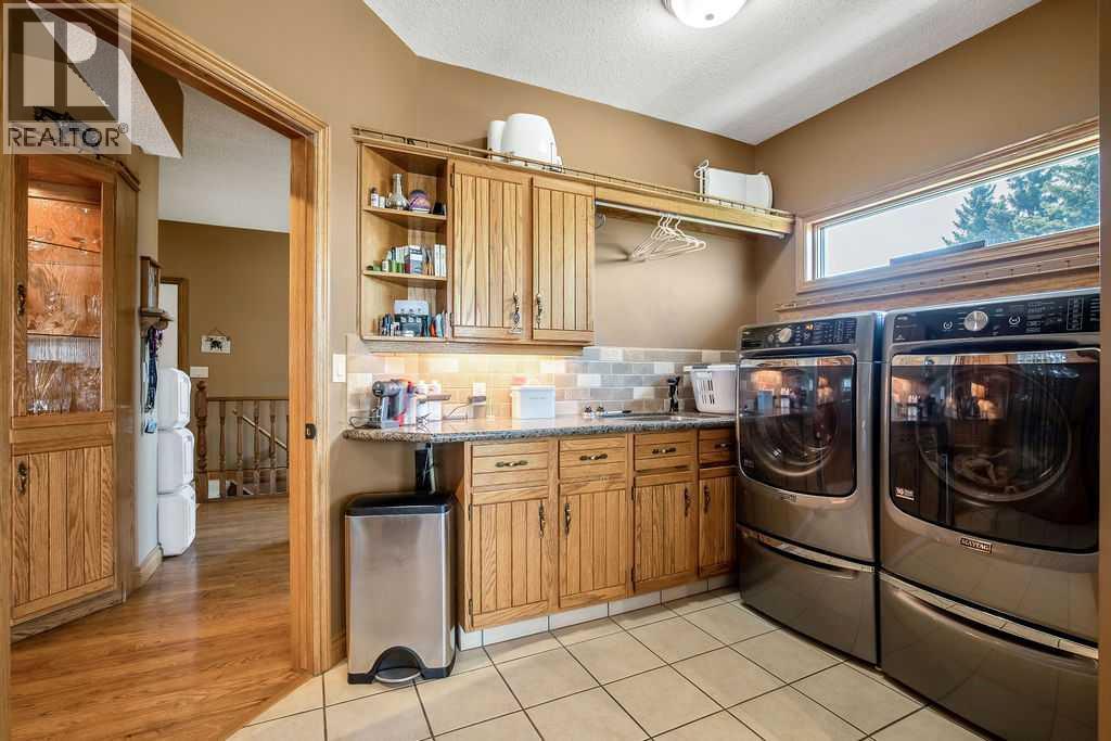 100, 182029 174 Avenue W, Priddis, Alberta  T1S 2B8 - Photo 22 - A2229058