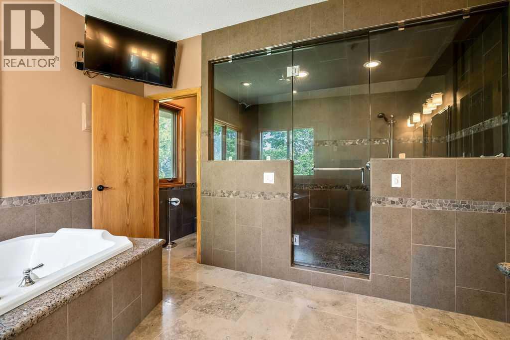 100, 182029 174 Avenue W, Priddis, Alberta  T1S 2B8 - Photo 27 - A2229058