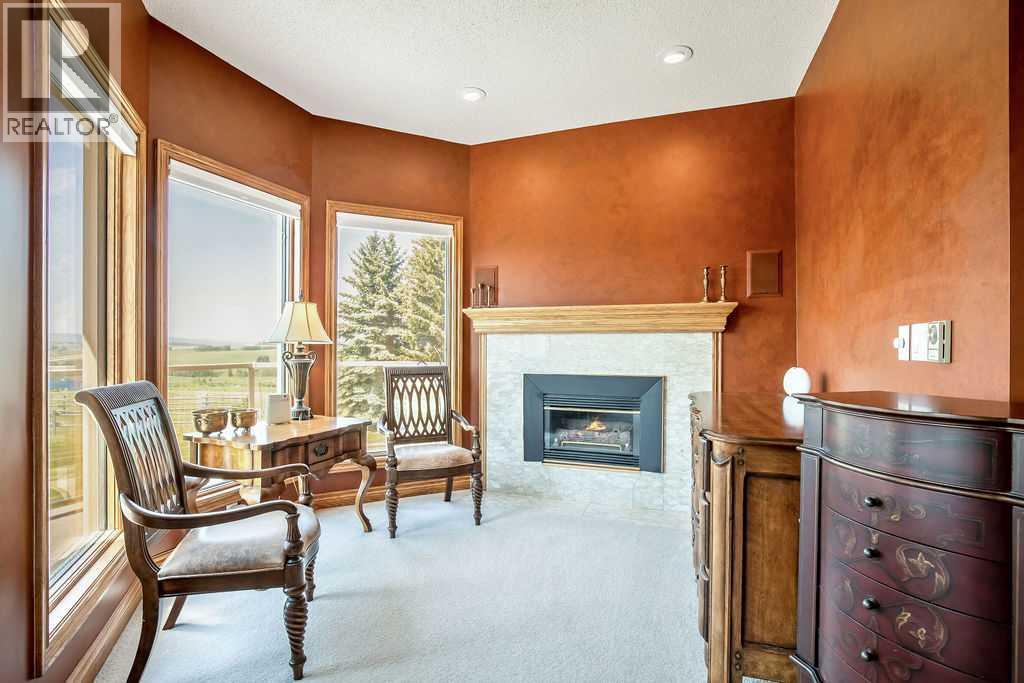 100, 182029 174 Avenue W, Priddis, Alberta  T1S 2B8 - Photo 24 - A2229058