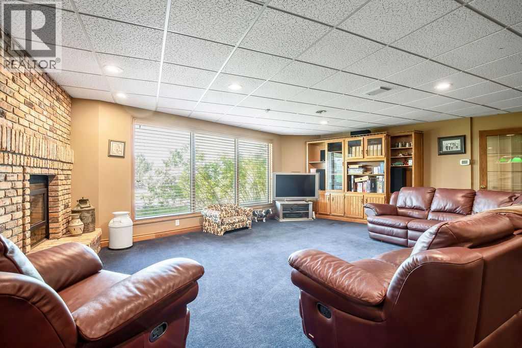 100, 182029 174 Avenue W, Priddis, Alberta  T1S 2B8 - Photo 32 - A2229058