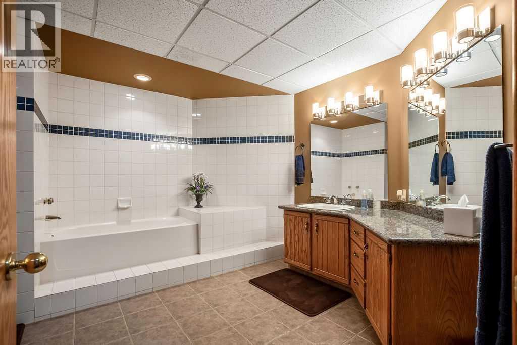 100, 182029 174 Avenue W, Priddis, Alberta  T1S 2B8 - Photo 34 - A2229058