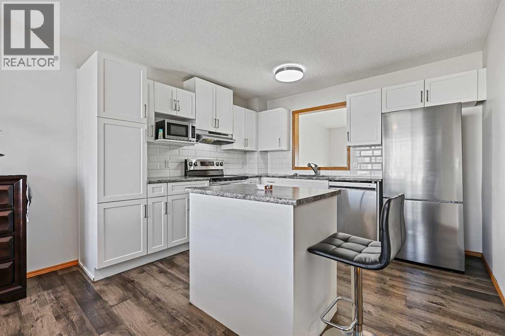 258 Rocky Ridge Court Nw, Calgary, Alberta  T3G 4S8 - Photo 8 - A2269726