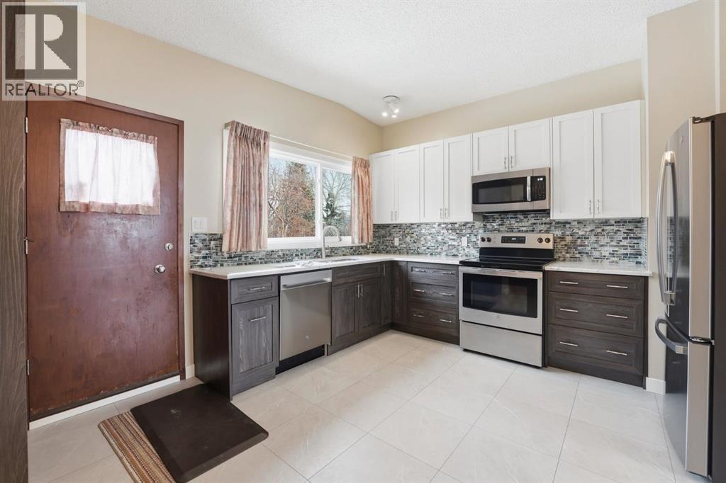 808 68 Avenue Nw, Calgary, Alberta  T2K 0N1 - Photo 7 - A2290453