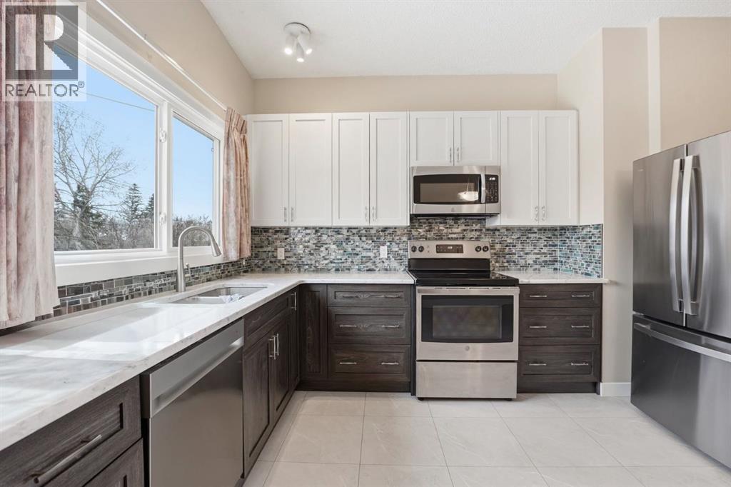 808 68 Avenue Nw, Calgary, Alberta  T2K 0N1 - Photo 10 - A2290453