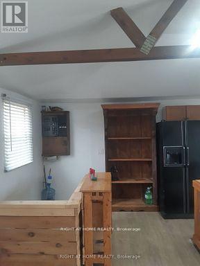 208 Mcguire Beach Road, Kawartha Lakes, Ontario  K0M 2B0 - Photo 4 - X12859916