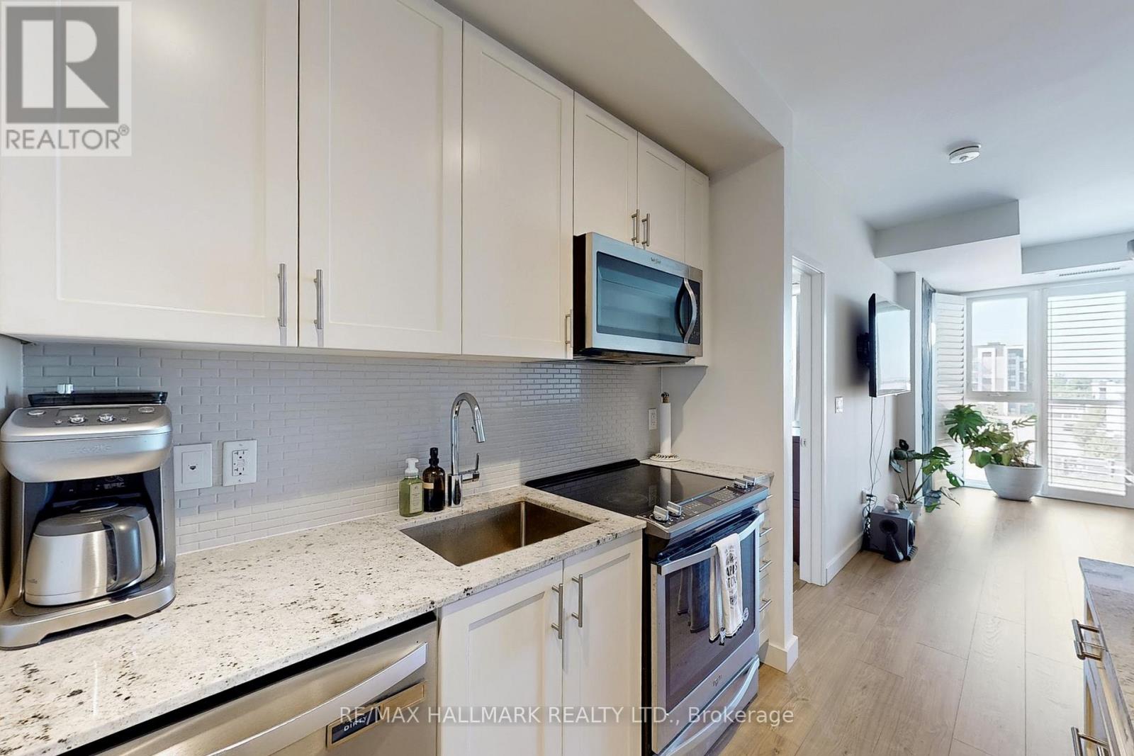 416 - 150 Sabina Drive, Oakville, Ontario  L6H 7C3 - Photo 10 - W12860082