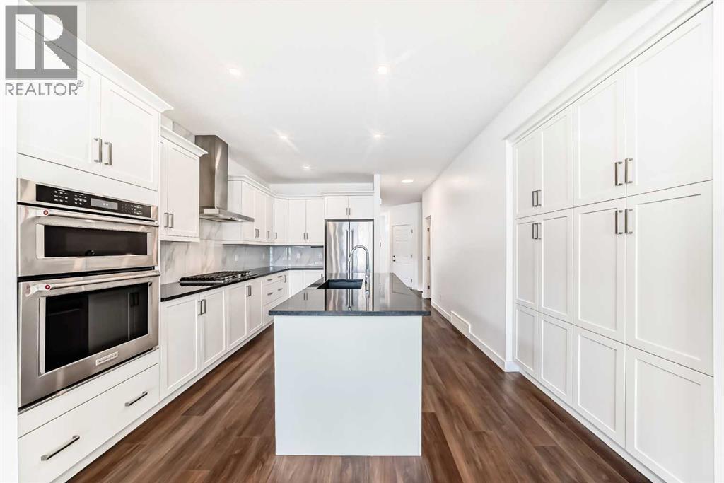 63 Riviera Court, Cochrane, Alberta  T4C 2V8 - Photo 5 - A2286903