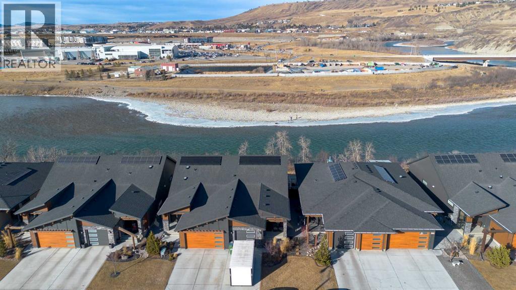 63 Riviera Court, Cochrane, Alberta  T4C 2V8 - Photo 2 - A2286903