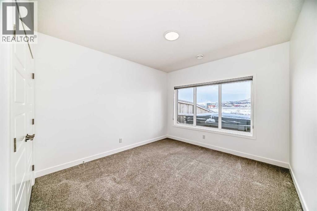 63 Riviera Court, Cochrane, Alberta  T4C 2V8 - Photo 27 - A2286903