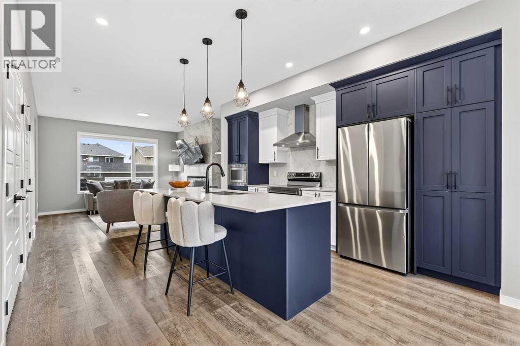 94 Wolf Gate Nw, Okotoks, Alberta  T1S 5T9 - Photo 5 - A2290958