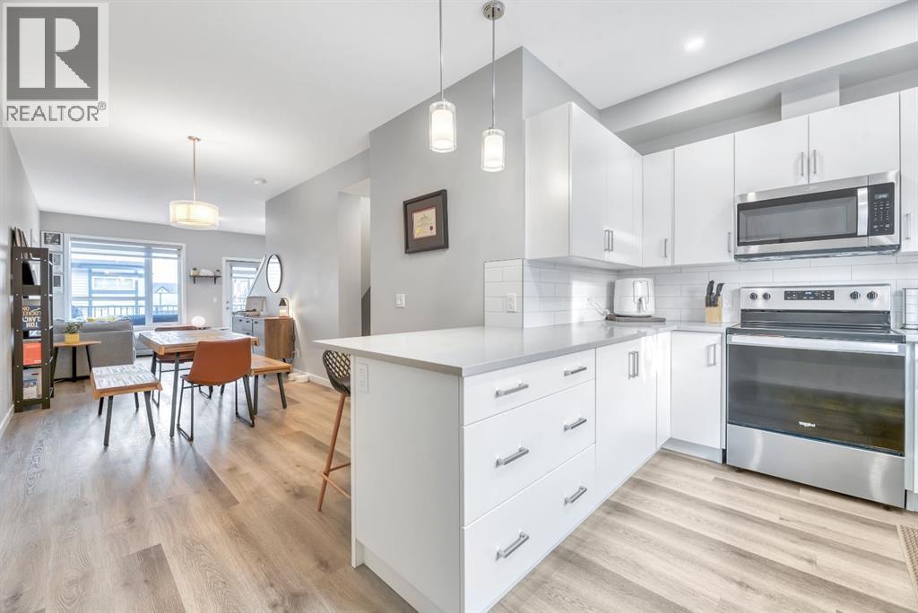 207, 850 Belmont Drive Sw, Calgary, Alberta  T2X 4A5 - Photo 1 - A2278450