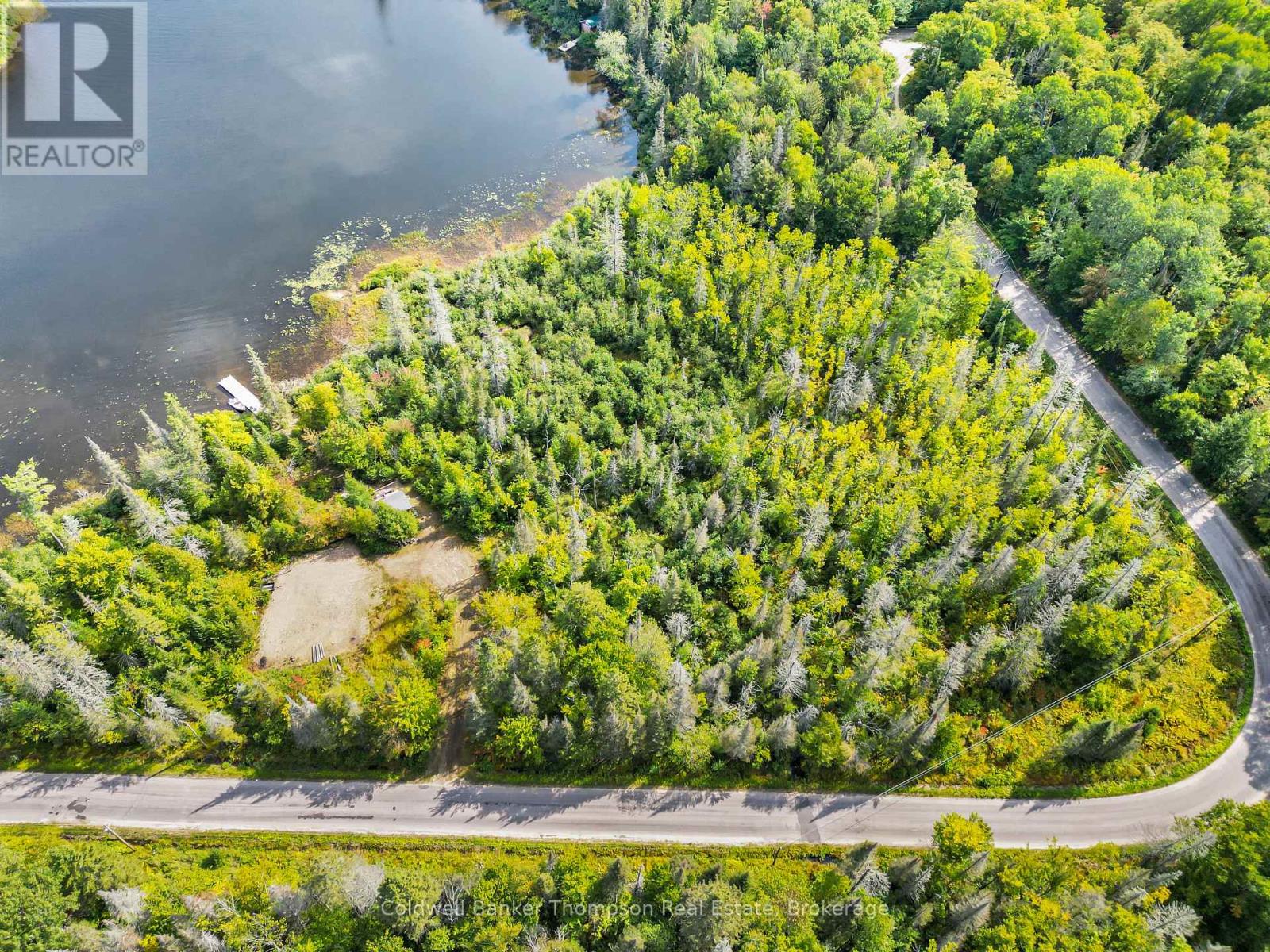 <div class="slider-price">$374,900</div><p>315 Scarlett Road, Machar, Ontario</p>