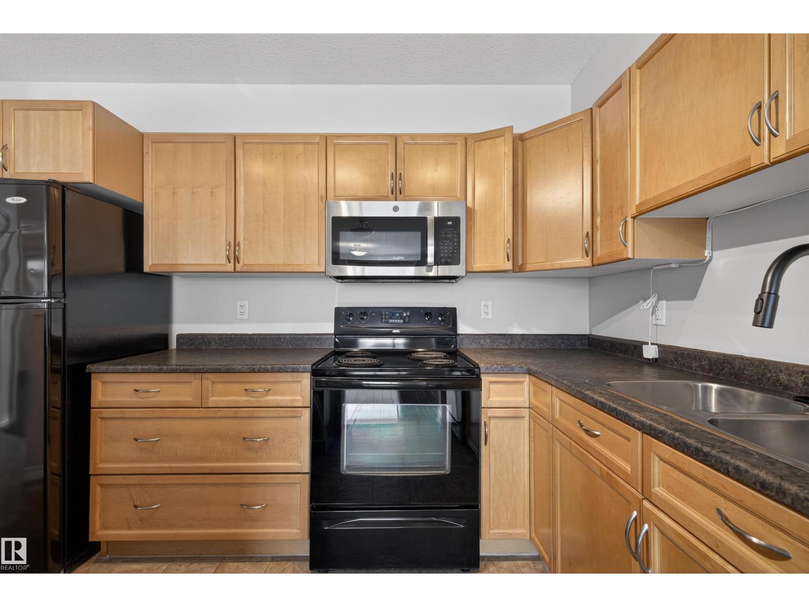 #102 1589 Glastonbury Bv Nw, Edmonton, Alberta  T5T 2V1 - Photo 4 - E4476301