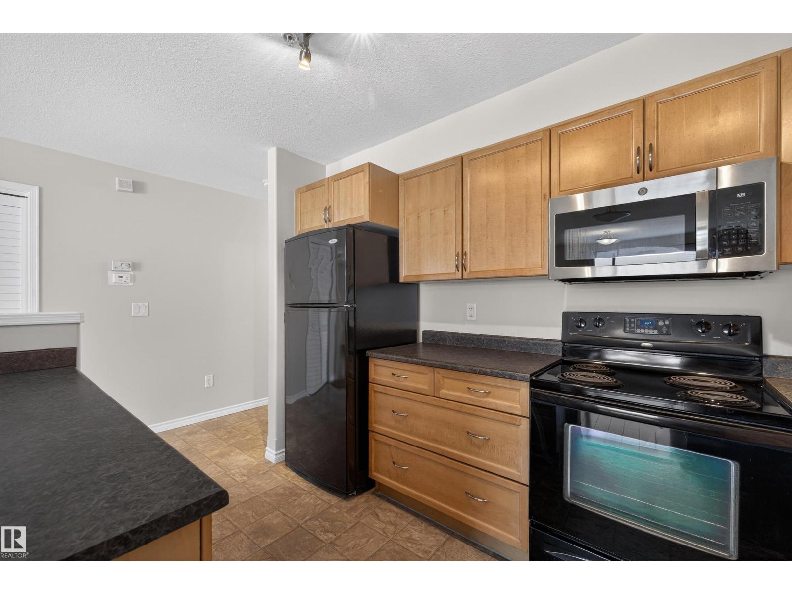 #102 1589 Glastonbury Bv Nw, Edmonton, Alberta  T5T 2V1 - Photo 3 - E4476301