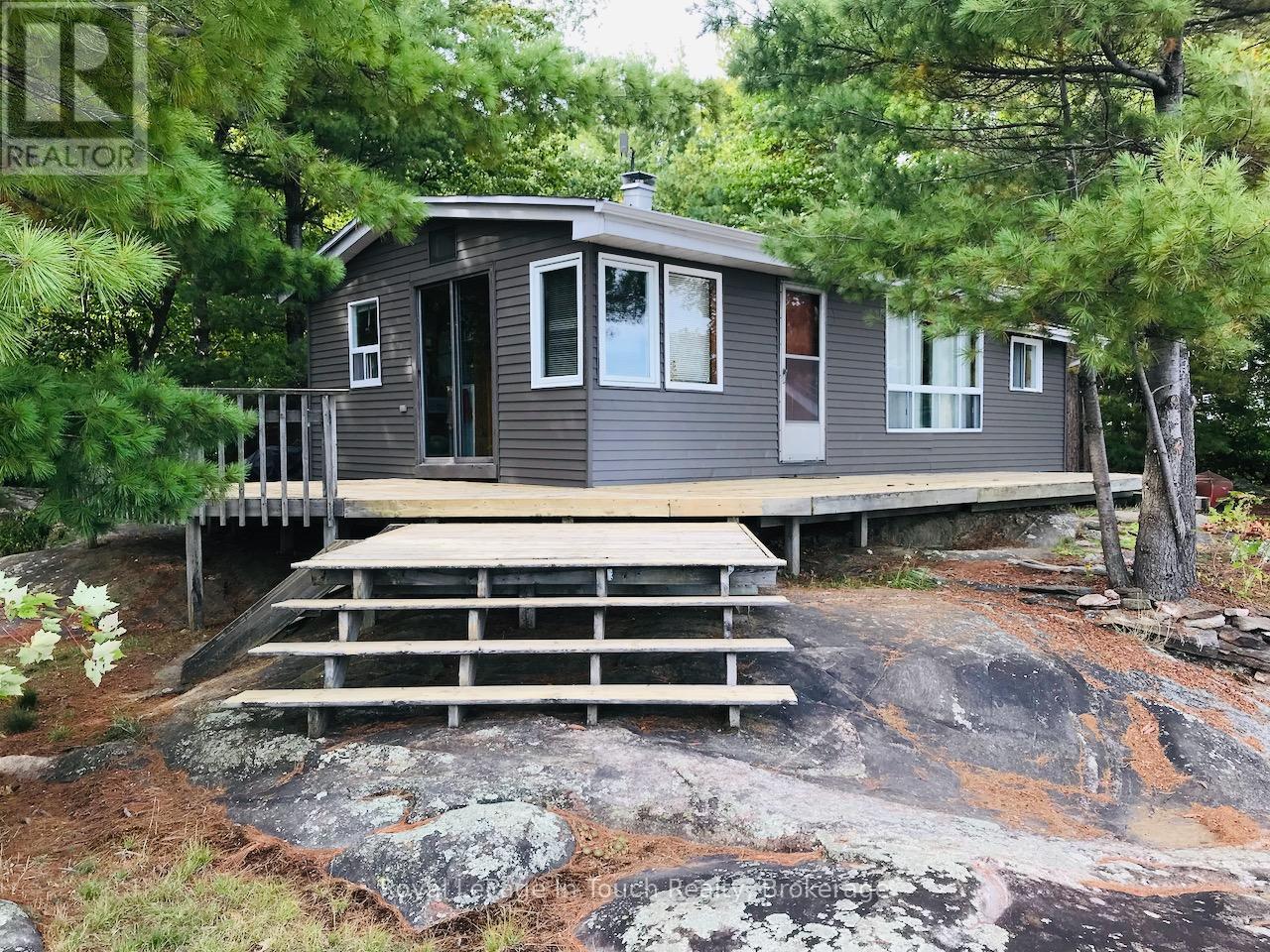 1916 Six Mile Lake Shore Island, Georgian Bay (Baxter), Ontario  L0K 1S0 - Photo 4 - X12861736