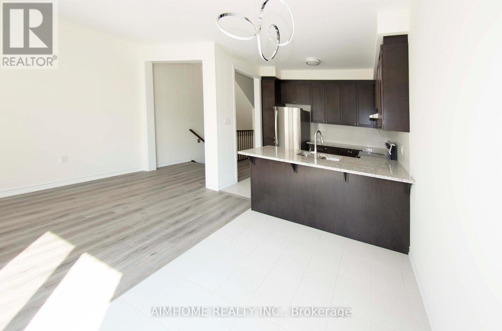 129 Stork Street, Oakville (Go Glenorchy), Ontario  L6H 0X8 - Photo 6 - W12861614