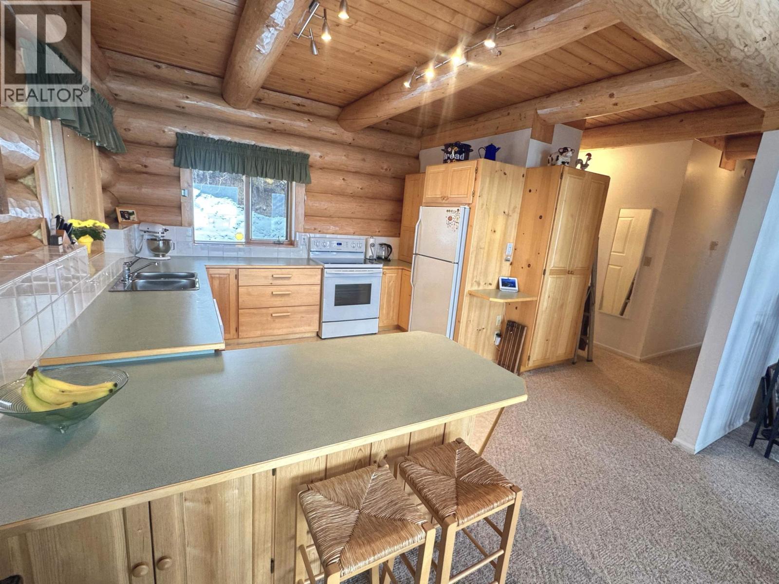 5278 Kallum Drive, 108 Mile Ranch, British Columbia  V0K 2Z0 - Photo 8 - R3094409