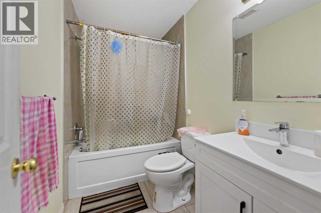 101 Taravista Crescent, Calgary, Alberta  T3J 4N8 - Photo 21 - A2288682