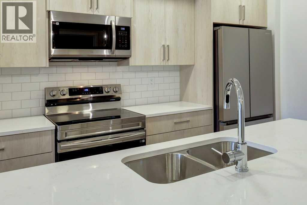 308, 245 Edith Place Nw, Calgary, Alberta  T3R 2C9 - Photo 9 - A2287737