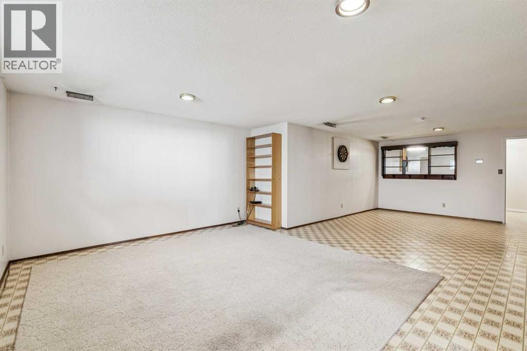 256 Huntridge Road Ne, Calgary, Alberta  T2K 4B6 - Photo 23 - A2290190