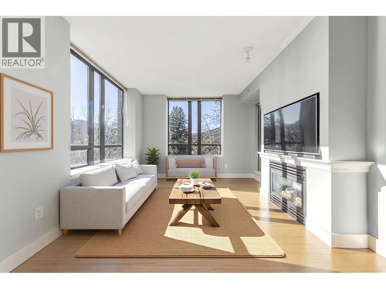 312 170 W 1st Street, North Vancouver, British Columbia  V7M 3P2 - Photo 1 - R3096181