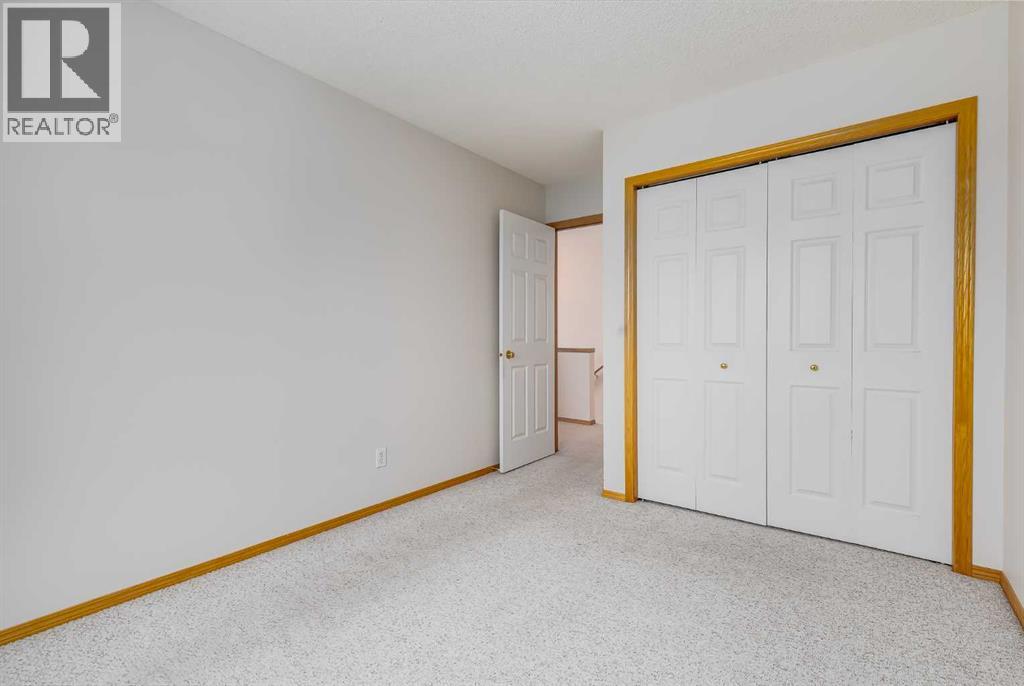 153 Rocky Ridge Court Nw, Calgary, Alberta  T3G 4S7 - Photo 22 - A2287379