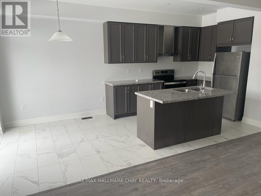 32 Wood Crescent, Essa (Angus), Ontario  L0M 1B5 - Photo 5 - N12862404