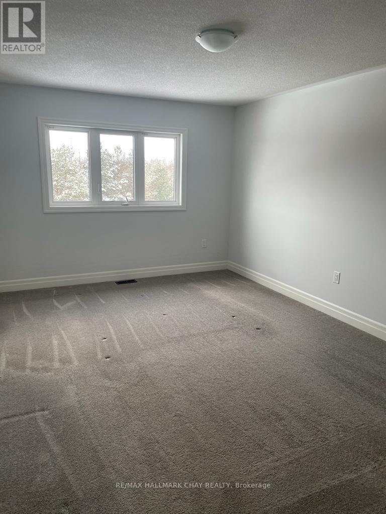 32 Wood Crescent, Essa (Angus), Ontario  L0M 1B5 - Photo 8 - N12862404