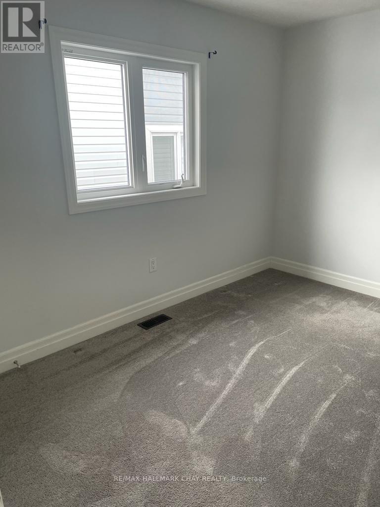 32 Wood Crescent, Essa (Angus), Ontario  L0M 1B5 - Photo 9 - N12862404