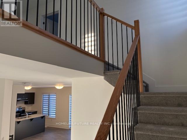 77 Dusenbury Drive, Loyalist, Ontario  K0H 2H0 - Photo 3 - X12862416