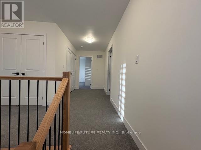 77 Dusenbury Drive, Loyalist, Ontario  K0H 2H0 - Photo 5 - X12862416