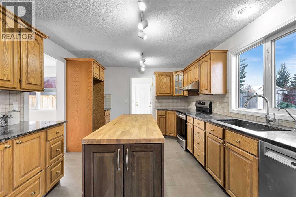 815 Woodpark Way Sw, Calgary, Alberta  T2W 2T9 - Photo 18 - A2288229