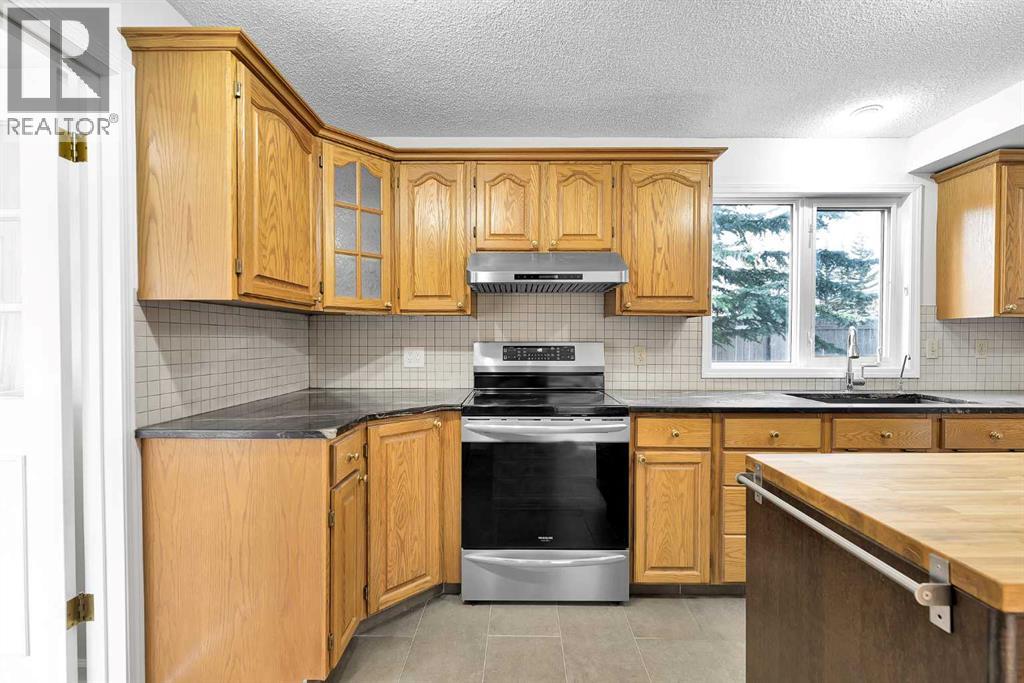 815 Woodpark Way Sw, Calgary, Alberta  T2W 2T9 - Photo 21 - A2288229