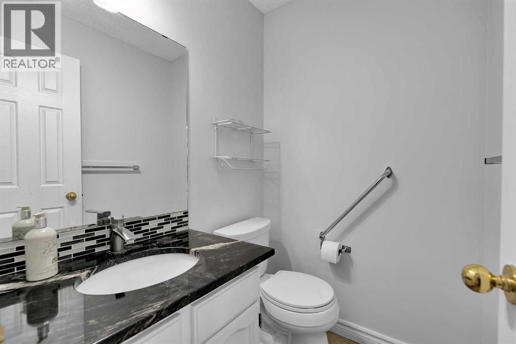 815 Woodpark Way Sw, Calgary, Alberta  T2W 2T9 - Photo 23 - A2288229